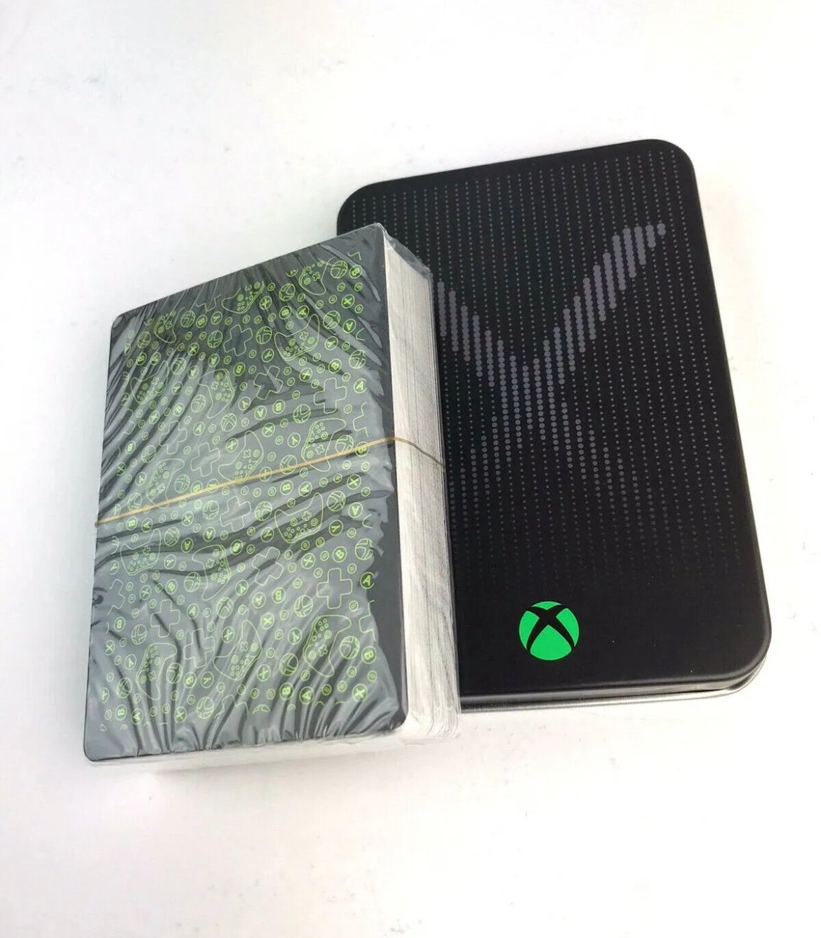 Xbox Playing Cards in a collectible tin, which is designed to resemble an Xbox console.