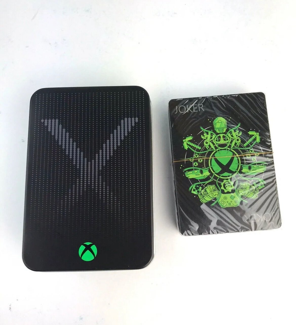 Xbox Playing Cards in a collectible tin, which is designed to resemble an Xbox console. 